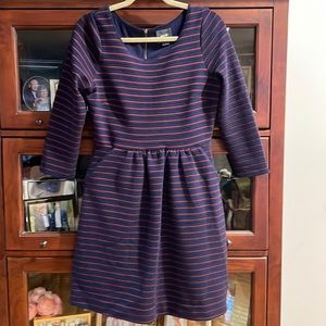 Super cute dress by Maeve. The color is Navy and garnet.